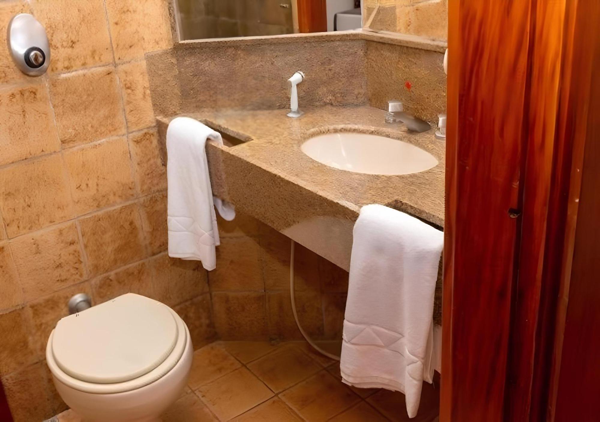 Voa Hotel Uniao Каксамбу Екстериор снимка